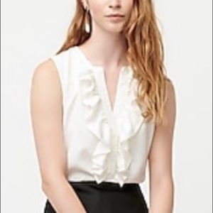 J Crew Ruffle front  top in ivory satin crepe.